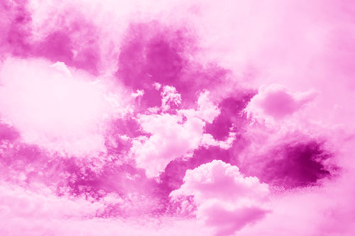 Spiraling Black Hole Swallows Pale Pastel Clouds (Pink Shade Photo)