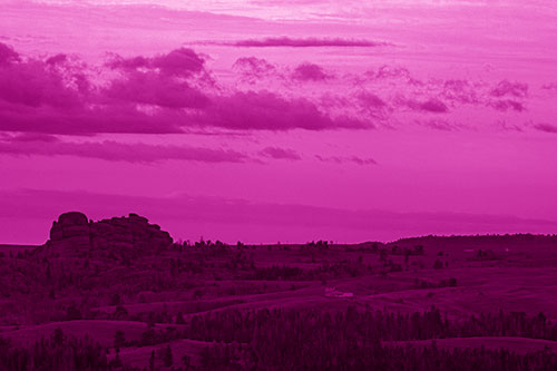 Sunrise Over Rock Formations On The Horizon (Pink Shade Photo)