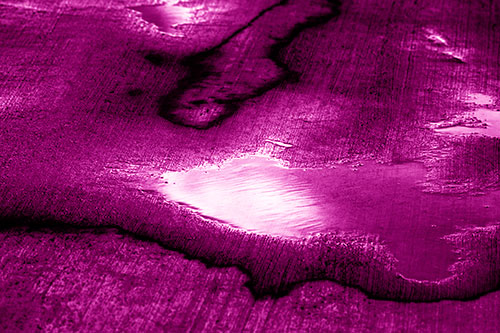 Water Puddles Dissipating After Rainstorm (Pink Shade Photo)