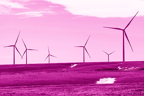 Wind Turbines Scattered Around Melting Snow Patches (Pink Shade Photo)