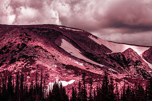 Clouds Cover Melted Snowy Mountain Range (Pink Tint Photo)