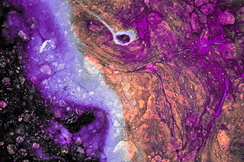Distressed Oil Face Swirling Among Rocky Shore (Pink Tint)