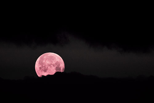 Easter Morning Moon Peeking Through Clouds (Pink Tint Photo)