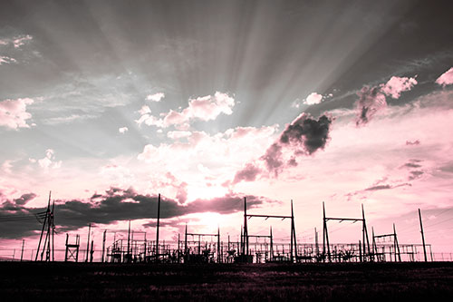 Electrical Substation Sunset Bursting Through Clouds (Pink Tint Photo)