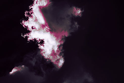 Evil Cloud Face Snarls Among Sky (Pink Tint Photo)