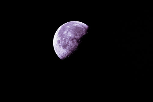 Half Blue Moon During Morning Orbit (Pink Tint Photo)