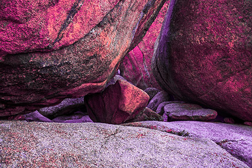 Large Crowded Boulders Leaning Against One Another (Pink Tint Photo)