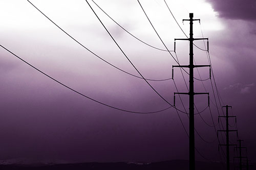 Powerlines Receding Into Thunderstorm (Pink Tint Photo)