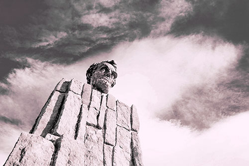 Presidents Statue Standing Tall Among Clouds (Pink Tint Photo)