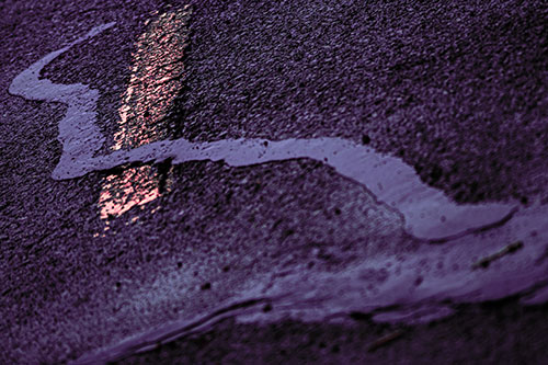 Slithering Tar Creeps Over Pavement Marking (Pink Tint Photo)