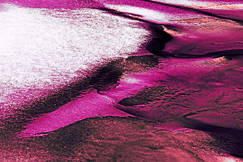 Sloping Ice Melting Atop River Water (Pink Tint Photo)