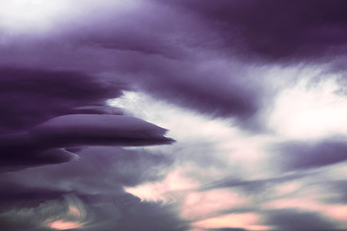 Smooth Cloud Sails Along Swirling Formations (Pink Tint Photo)
