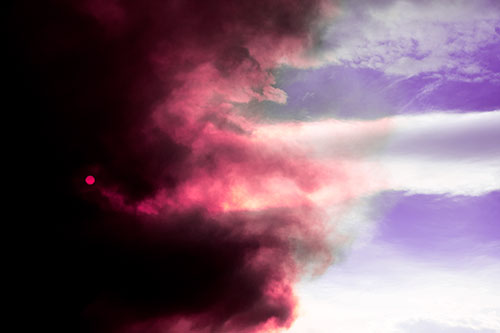 Sun Spiraling Out Of Mullen Fire Clouds (Pink Tint Photo)