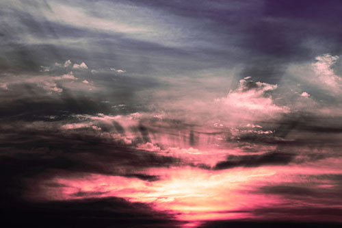 Sunrise Bursting Colorful Light Past Clouds (Pink Tint Photo)