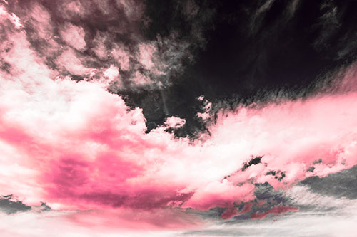 Sunset Illuminating Large Cloud Mass (Pink Tint)