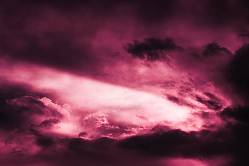 White Light Tearing Through Clouds (Pink Tint Photo)