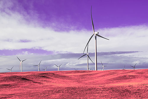Wind Turbine Cluster Overtaking Hilly Horizon (Pink Tint Photo)