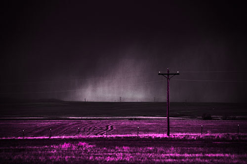 Distant Thunderstorm Rains Down Upon Powerlines (Pink Tone Photo)
