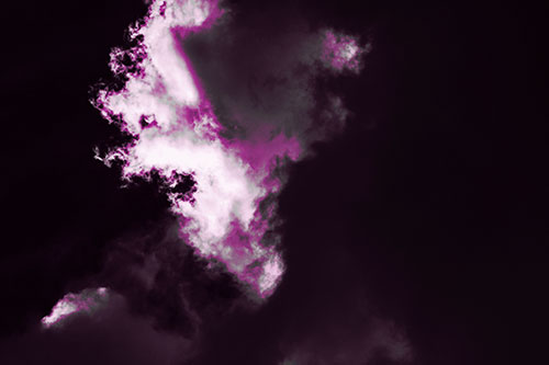 Evil Cloud Face Snarls Among Sky (Pink Tone Photo)