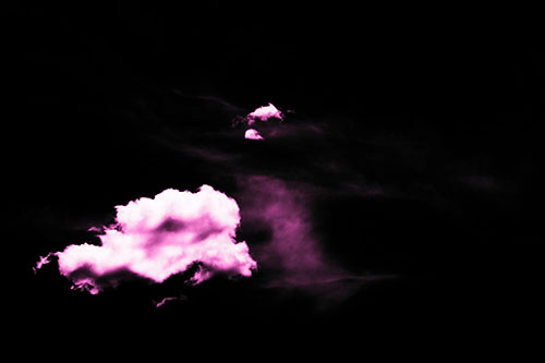 Isolated Creature Head Cloud Appears Within Darkness (Pink Tone Photo)