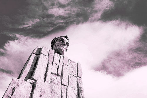 Presidents Statue Standing Tall Among Clouds (Pink Tone Photo)