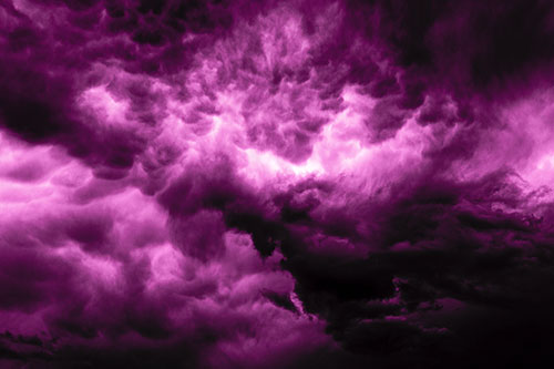 Raging Thunderstorm Clouds Brewing Among Sky (Pink Tone)