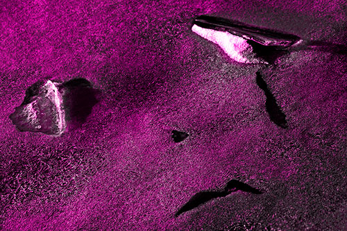 Sad Teardrop Ice Face Appears Atop Frozen River (Pink Tone Photo)