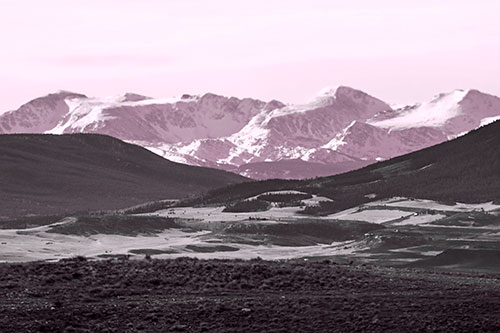 Snow Capped Mountains Behind Hills (Pink Tone Photo)