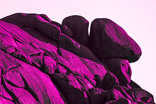 Sunlight Casting Shadows On Mountain Of Rocks (Pink Tone Photo)
