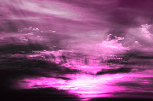 Sunrise Bursting Colorful Light Past Clouds (Pink Tone Photo)