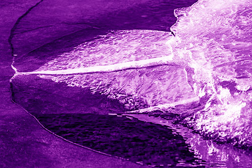 Abstract Ice Sculpture Forms Atop Frozen River (Purple Shade Photo)
