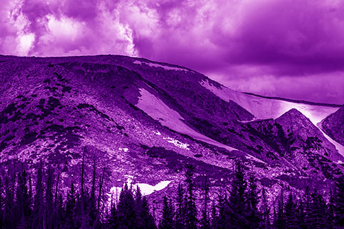 Clouds Cover Melted Snowy Mountain Range (Purple Shade Photo)