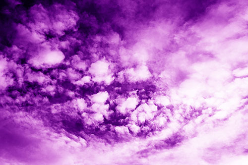 Cluster Clouds Forming Off White Mass (Purple Shade Photo)