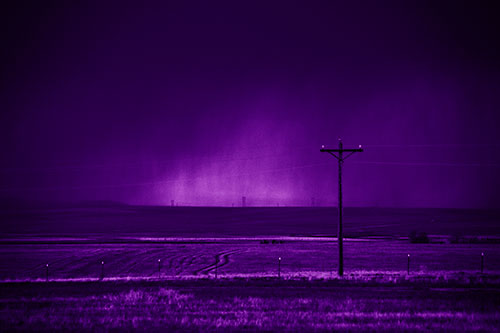 Distant Thunderstorm Rains Down Upon Powerlines (Purple Shade Photo)