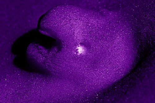 Glowing Eyed Snow Face Emerges Above Soil (Purple Shade)