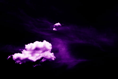 Isolated Creature Head Cloud Appears Within Darkness (Purple Shade Photo)