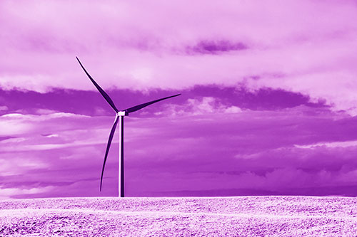 Lone Wind Turbine Standing Along Dry Prairie Horizon (Purple Shade Photo)