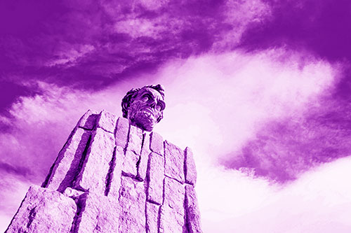 Presidents Statue Standing Tall Among Clouds (Purple Shade Photo)