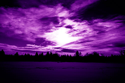 Sun Vortex Illuminates Clouds Above Dark Lit Lake (Purple Shade Photo)