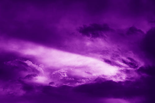 White Light Tearing Through Clouds (Purple Shade Photo)