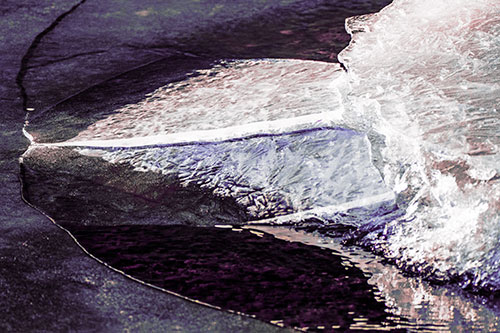 Abstract Ice Sculpture Forms Atop Frozen River (Purple Tint Photo)