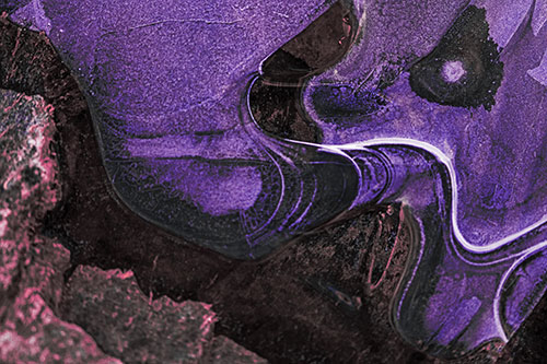 Angry Fuming Frozen River Ice Face (Purple Tint Photo)