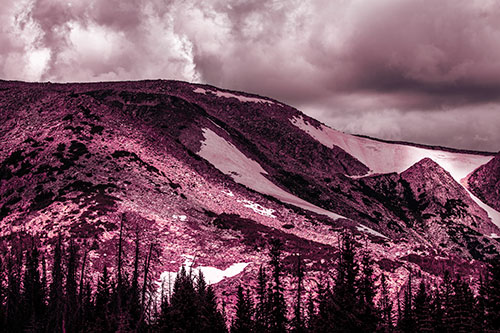 Clouds Cover Melted Snowy Mountain Range (Purple Tint)