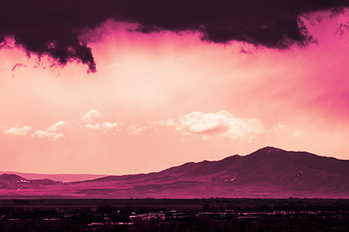 Dark Cloud Mass Above Mountain Range Horizon (Purple Tint Photo)