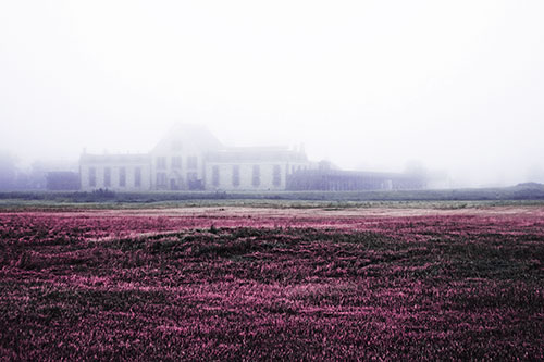 Dense Fog Consumes Distant Historic State Penitentiary (Purple Tint Photo)