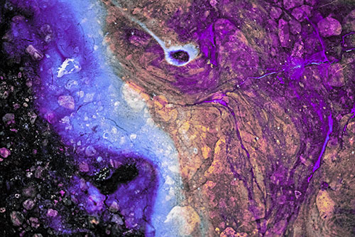Distressed Oil Face Swirling Among Rocky Shore (Purple Tint)