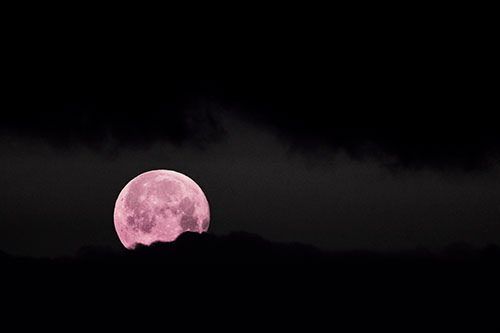 Easter Morning Moon Peeking Through Clouds (Purple Tint Photo)
