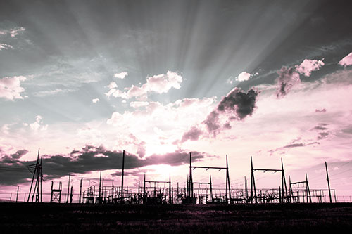 Electrical Substation Sunset Bursting Through Clouds (Purple Tint Photo)