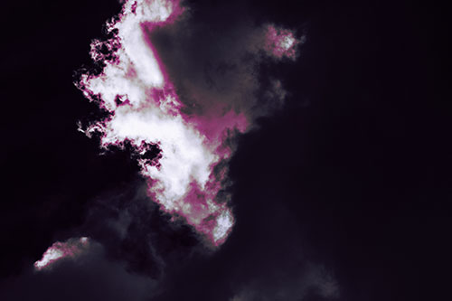 Evil Cloud Face Snarls Among Sky (Purple Tint Photo)