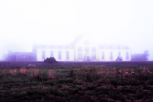 Fog Engulfs Historic State Penitentiary (Purple Tint Photo)